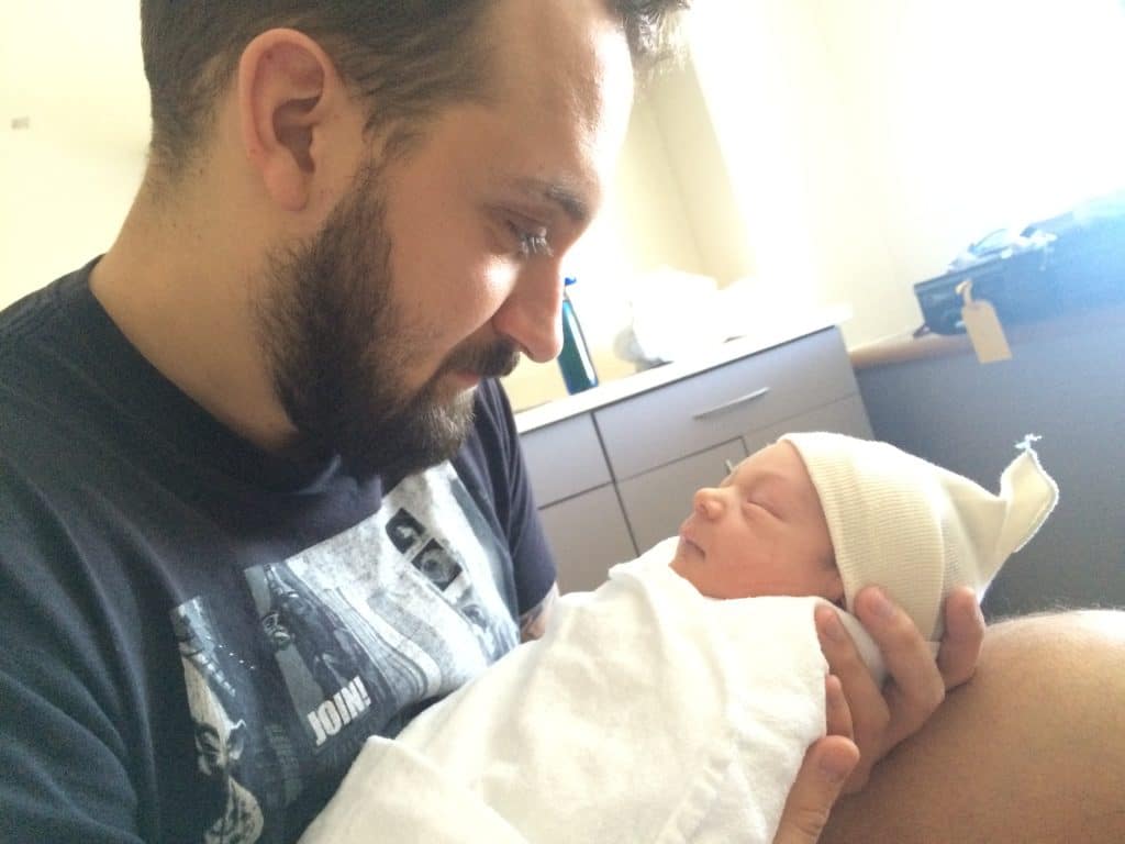 Holding my newborn son.