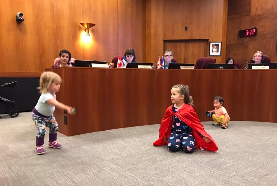Superhero babies taking over New Westminster's Council Meeting.