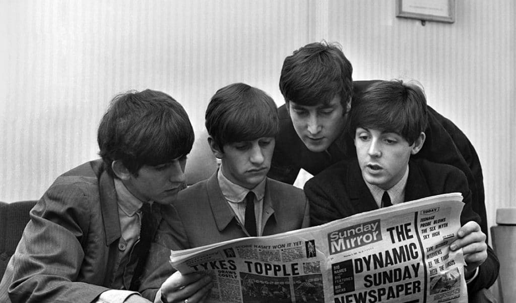 The Beatles with Newspaper